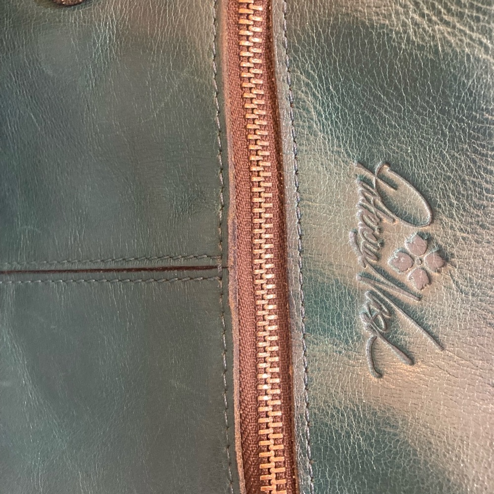 Mint condition Patricia Nash teal Crossbody bag lightly worn.
